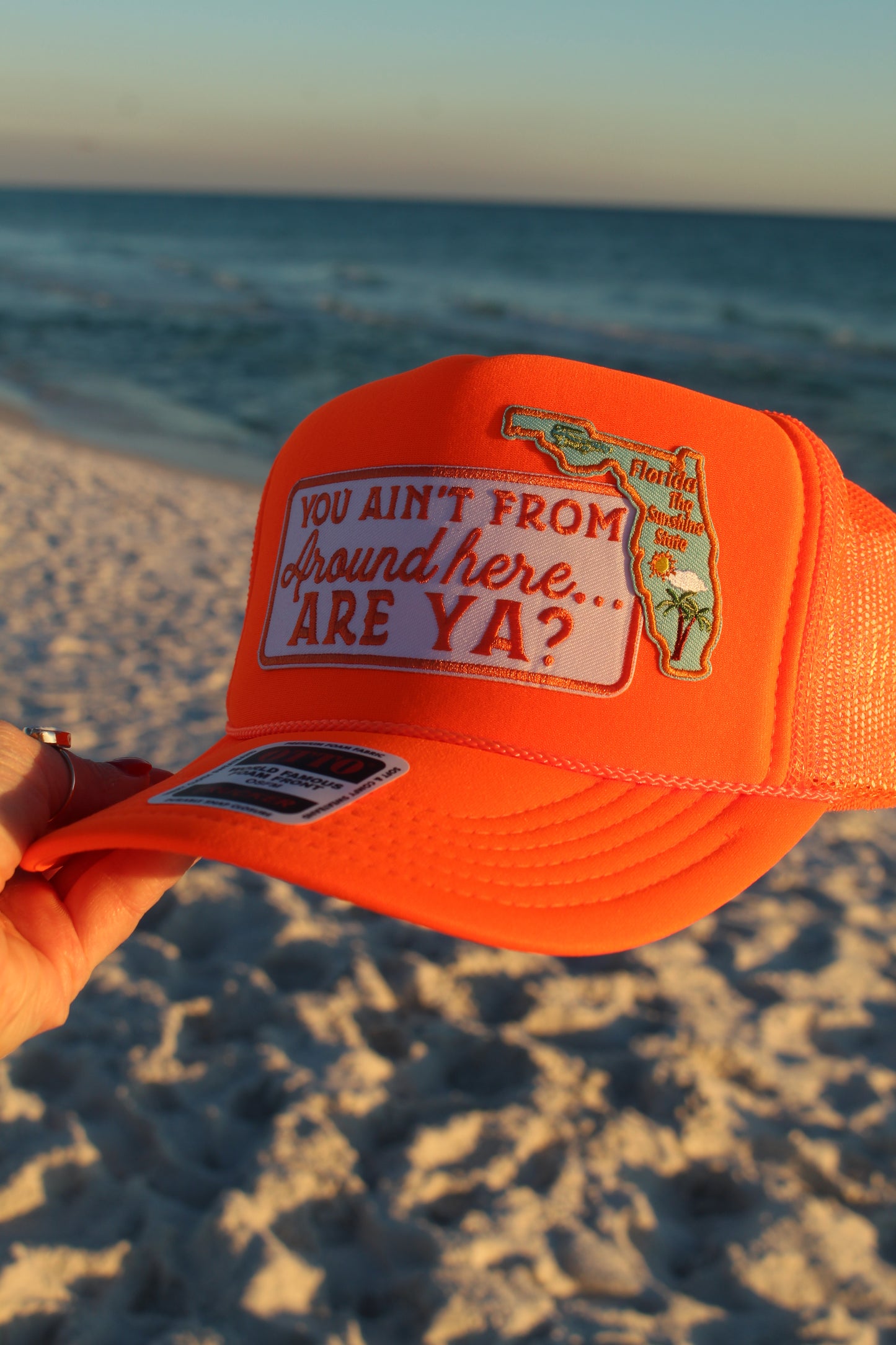 "You Ain't From Around here... ARE YA?" w/ state of Florida Patch - Neon Orange Otto Trucker Hat